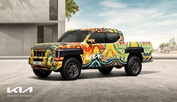 Vistazo al Kia Tasman 2025 con camuflaje, visión lateral completa. Vistazo al Kia Tasman 2025 con camuflaje, visión lateral completa.