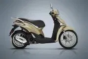 Vista lateral del scooter Piaggio Liberty resaltando su diseño elegante y urbano. Vista lateral del scooter Piaggio Liberty resaltando su diseño elegante y urbano.