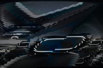 Vista interior nocturna del Smart 5 2025 Concept, iluminación ambiental y panorámica del techo.