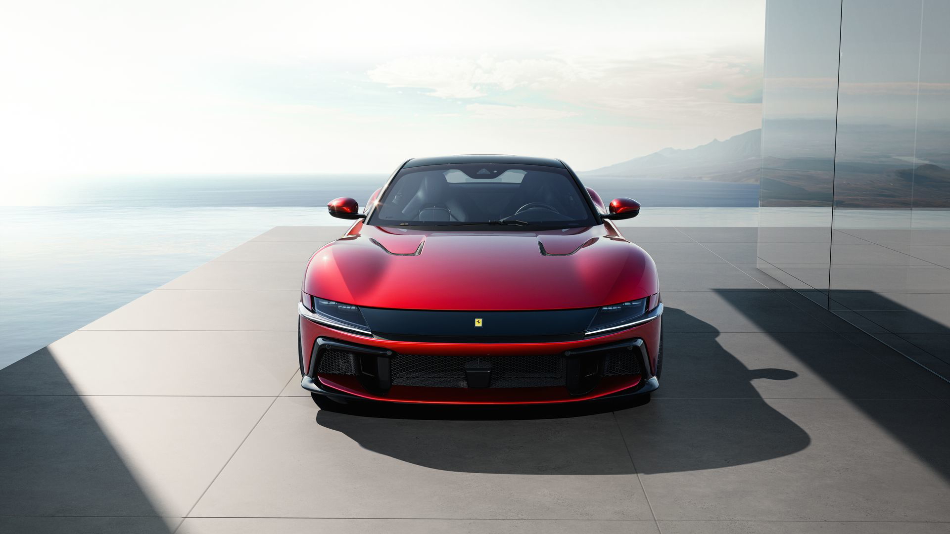 Fascinante vista frontal del Ferrari con acentos en rojo y detalles en negro.