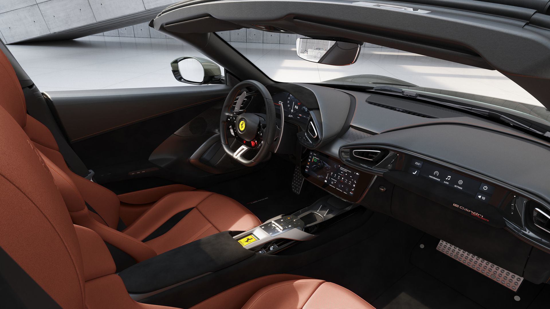 Vista del habitáculo de un Ferrari con enfásis en la calidad y diseño vanguardista de los asientos.