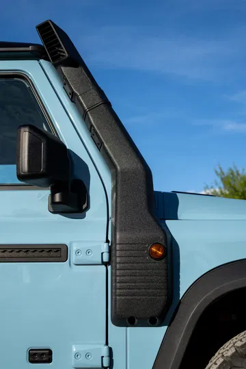 Vista lateral del Ineos Grenadier Quartermaster destacando su diseño robusto