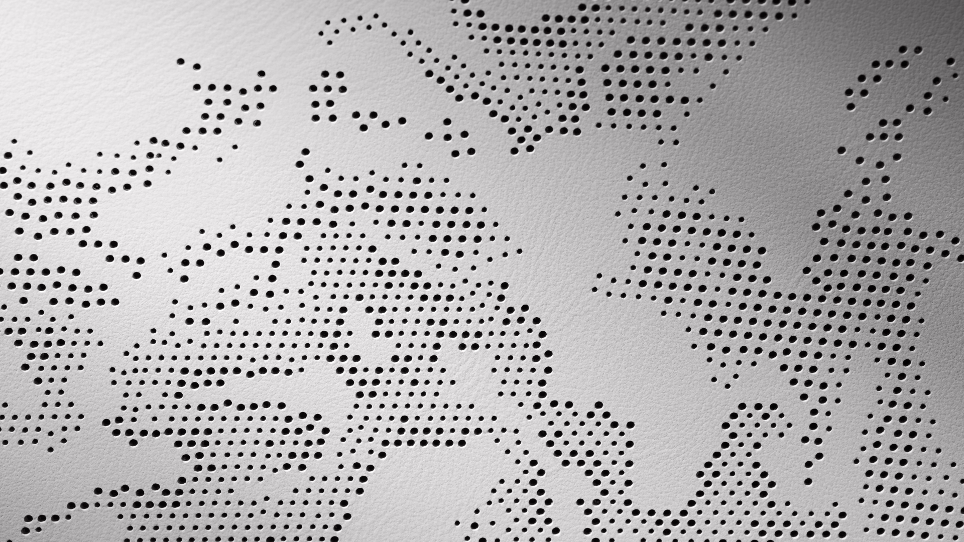 Detalle de textura premium en el interior de un Rolls-Royce Cullinan 2024