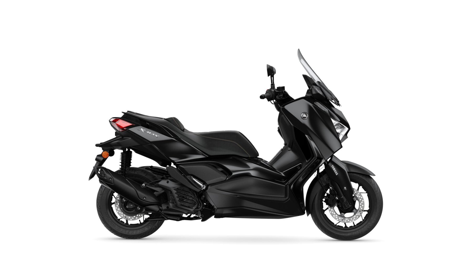 Vista lateral Yamaha X-Max 125cc, destacando su diseño aerodinámico y elegante.