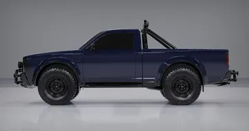 Vista lateral del Alpha Wolf, un pick-up eléctrico de estética retro.