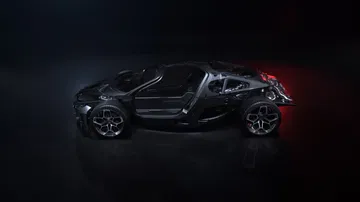Vista lateral del Bugatti Tourbillon, una obra maestra de la ingeniería automotriz.