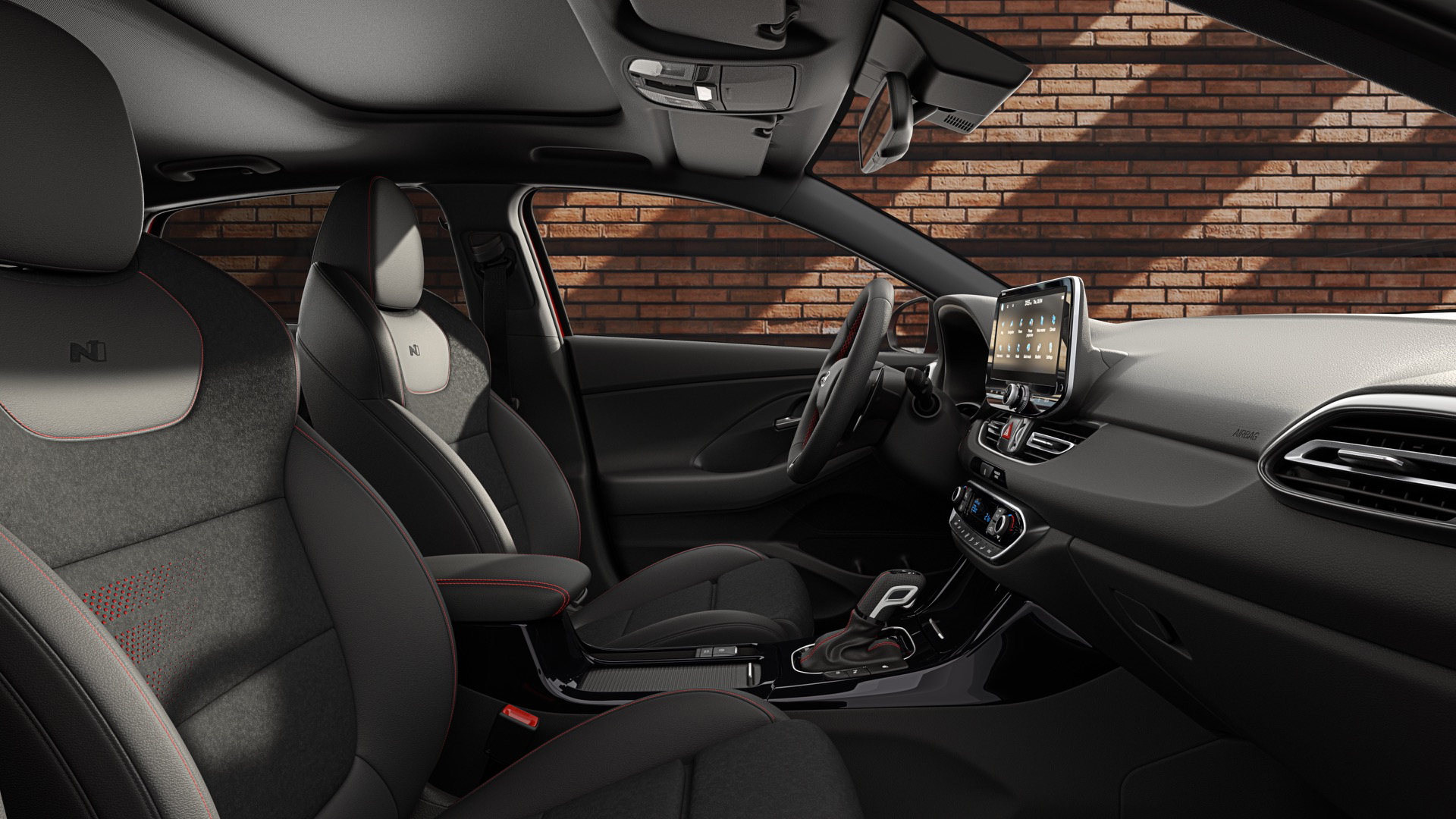 Vista lateral del habitáculo del Hyundai i30 Fastback N Line, destacando acabados y ergonomía