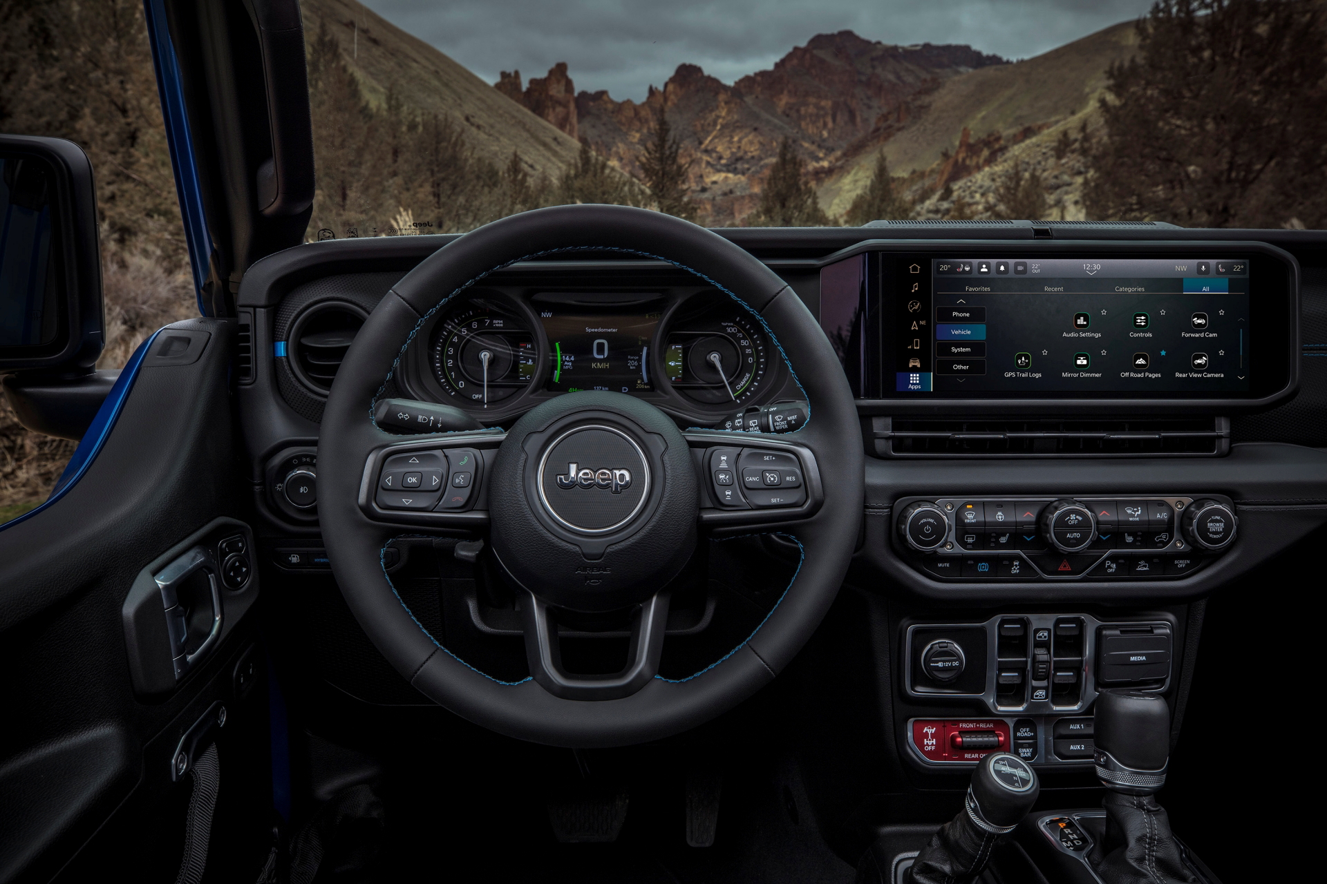 Cabina Jeep Wrangler 2024 con enfoque en volante y consola