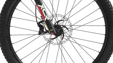 Primer plano del buje y mecanismo de suspensión de la ebike.