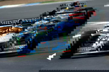 Benetton B194 de Schumacher luchando en pista, F1 1994