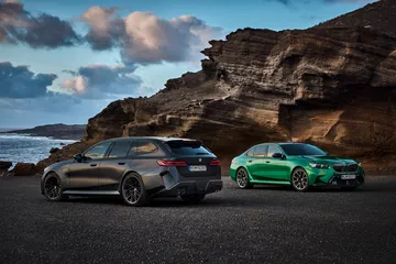 Un BMW M5 Touring mostrando su imponente perfil lateral.