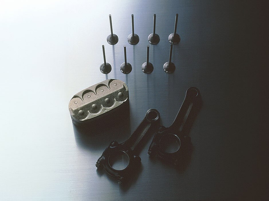 Revolutionary Honda engine with oval pistons, 8 valves, and dual spark plugs per cylinder.