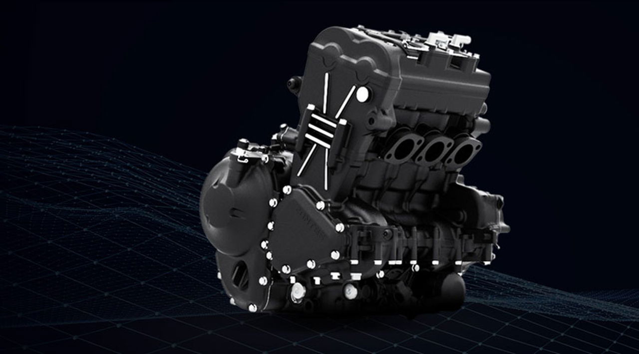 Vista del motor tricilíndrico de la Zontes 703F, una unidad compacta y eficiente.