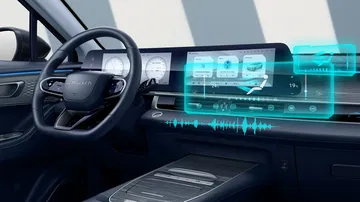 Cabina futurista con pantalla digital integrada.