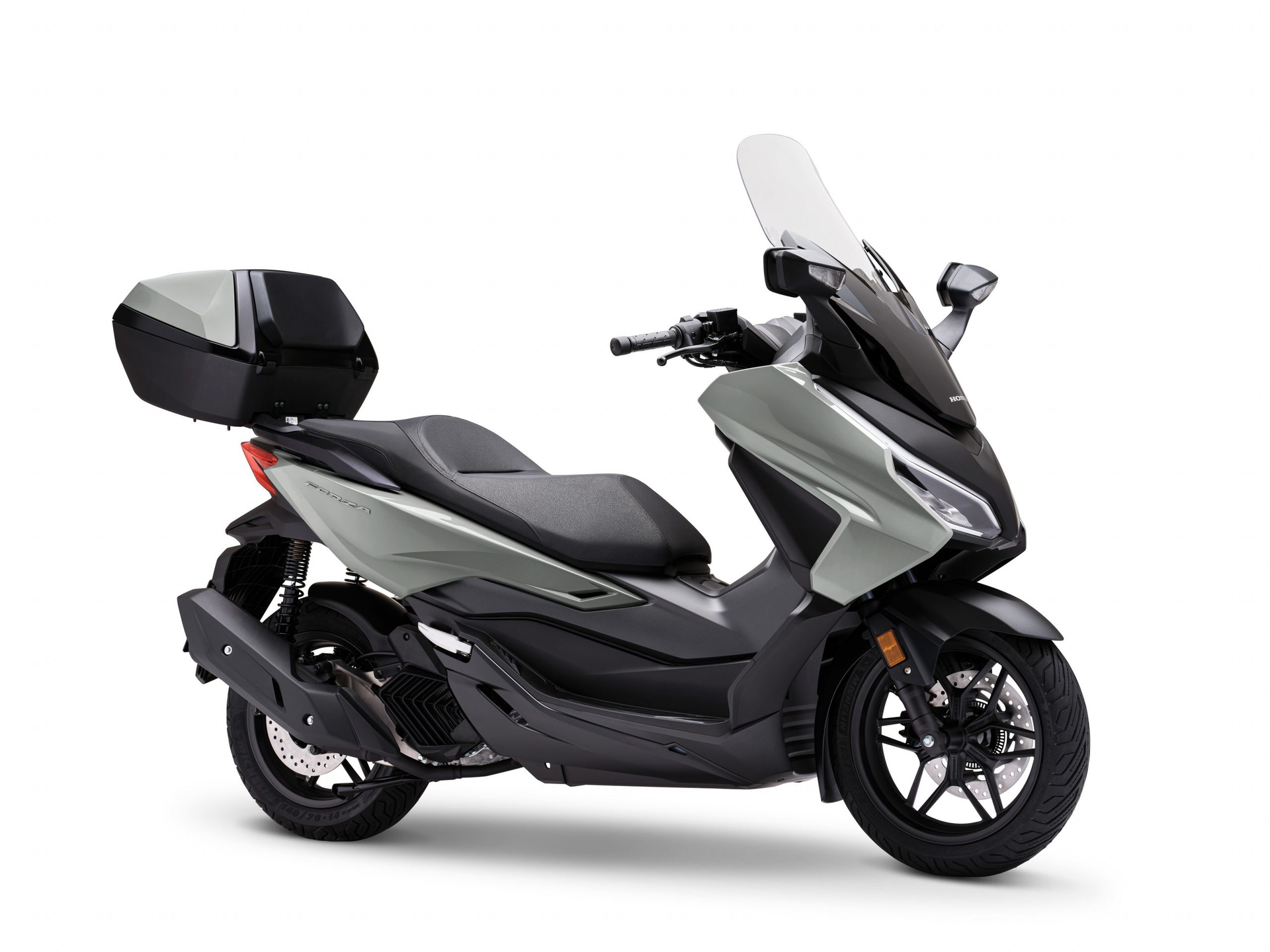 Vista lateral del Honda Forza 125, un scooter con diseño elegante y moderno.
