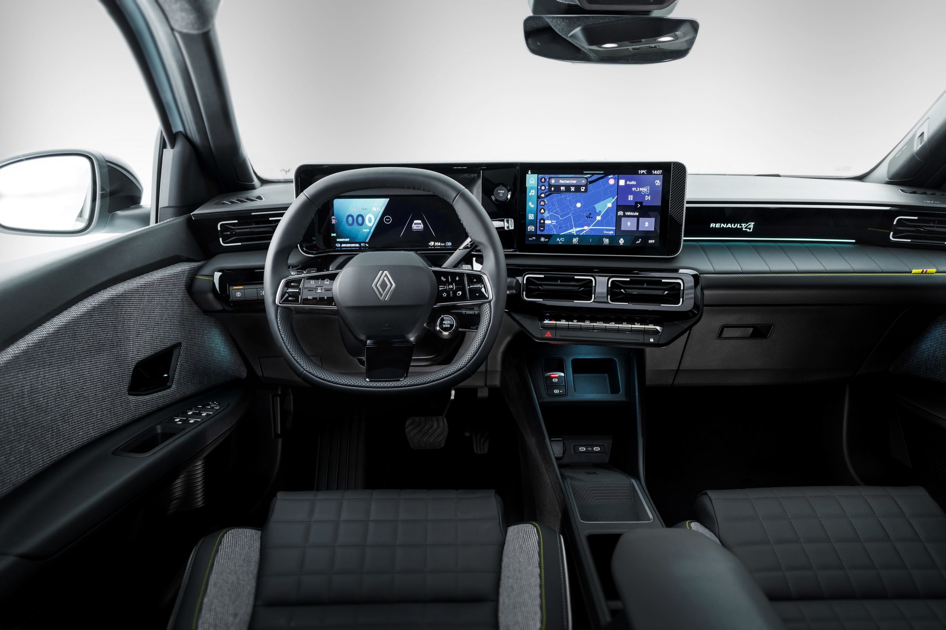 Vista moderna y tecnológica del interior del Renault 4 2025 con acabados de primera.