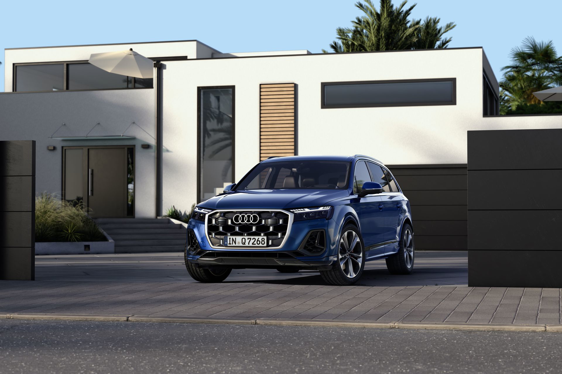 Vista frontal y lateral del Audi Q7, mostrando su imponente diseño.