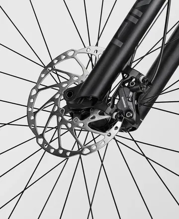Primer plano del sistema de freno de disco de una e-bike Canyon Neuron.