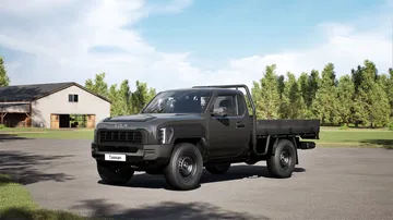 Vista lateral de la Kia Tasman 2025, robusta y preparada para el reto off-road