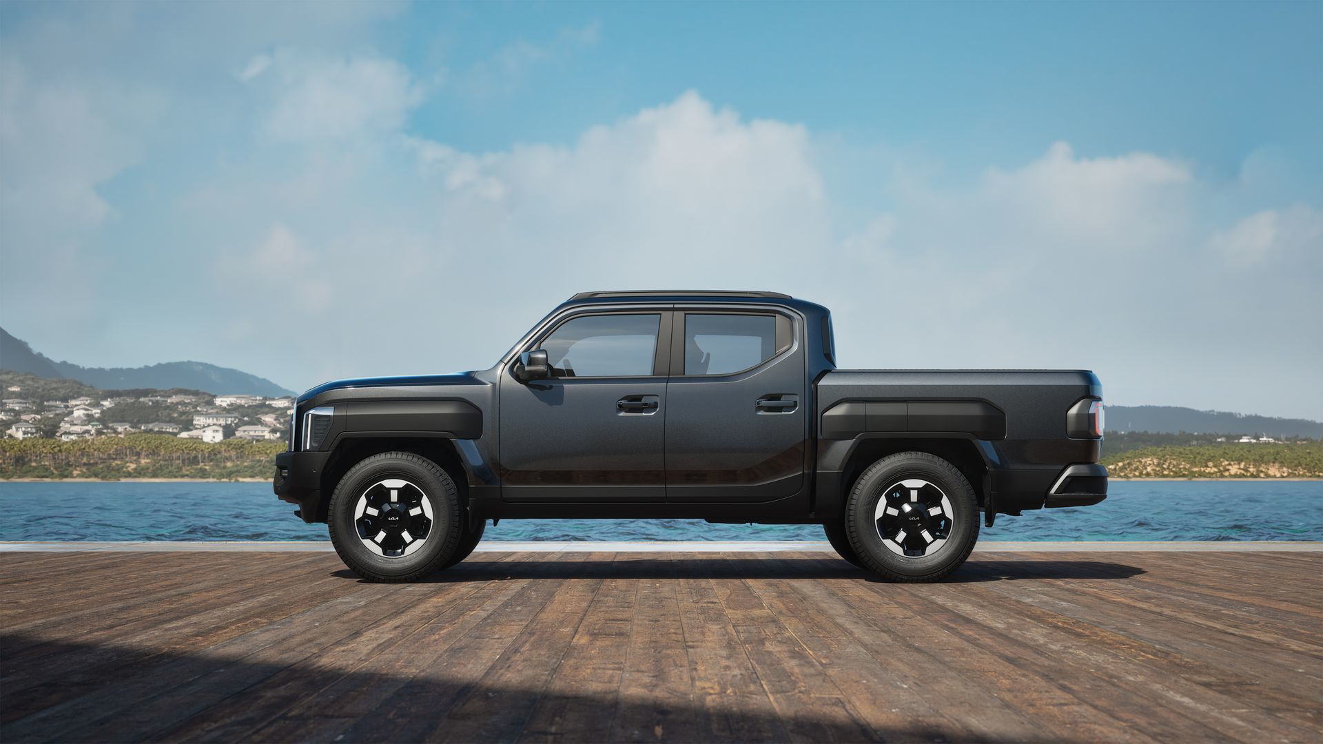 Vista dinámica lateral de la nueva pickup Kia Tasman 2025.