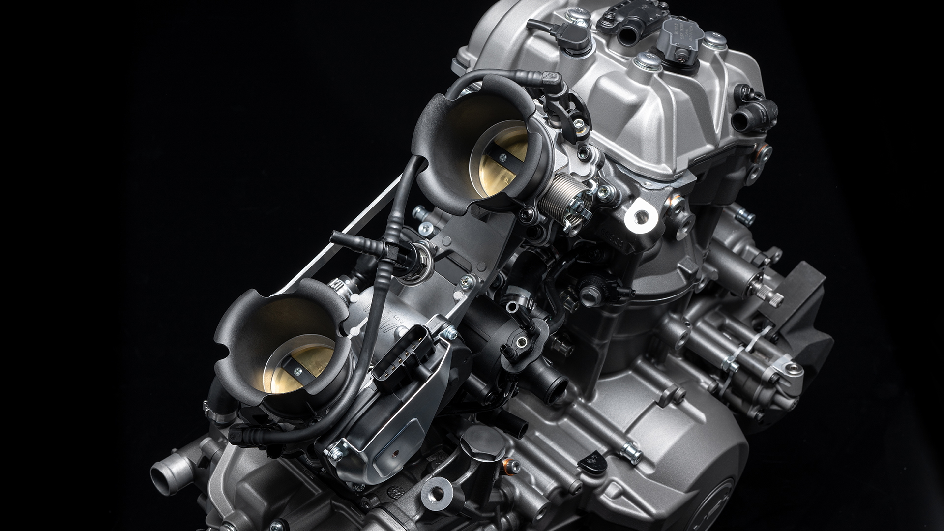 Motor Ducati V2 ligero y potente, sin sistema desmodrómico.