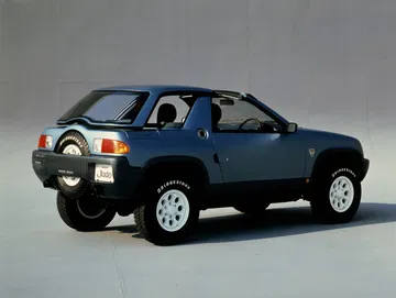 Vista lateral del Nissan Judo, destacando su diseño compacto y robusto
