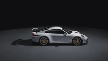 Vista lateral Porsche 911 GT3 992 destacando sus líneas aerodinámicas y deportivas.