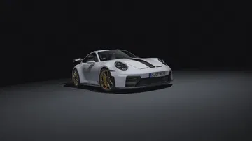 Vista lateral que muestra la estilizada silueta del Porsche 911 GT3 992.