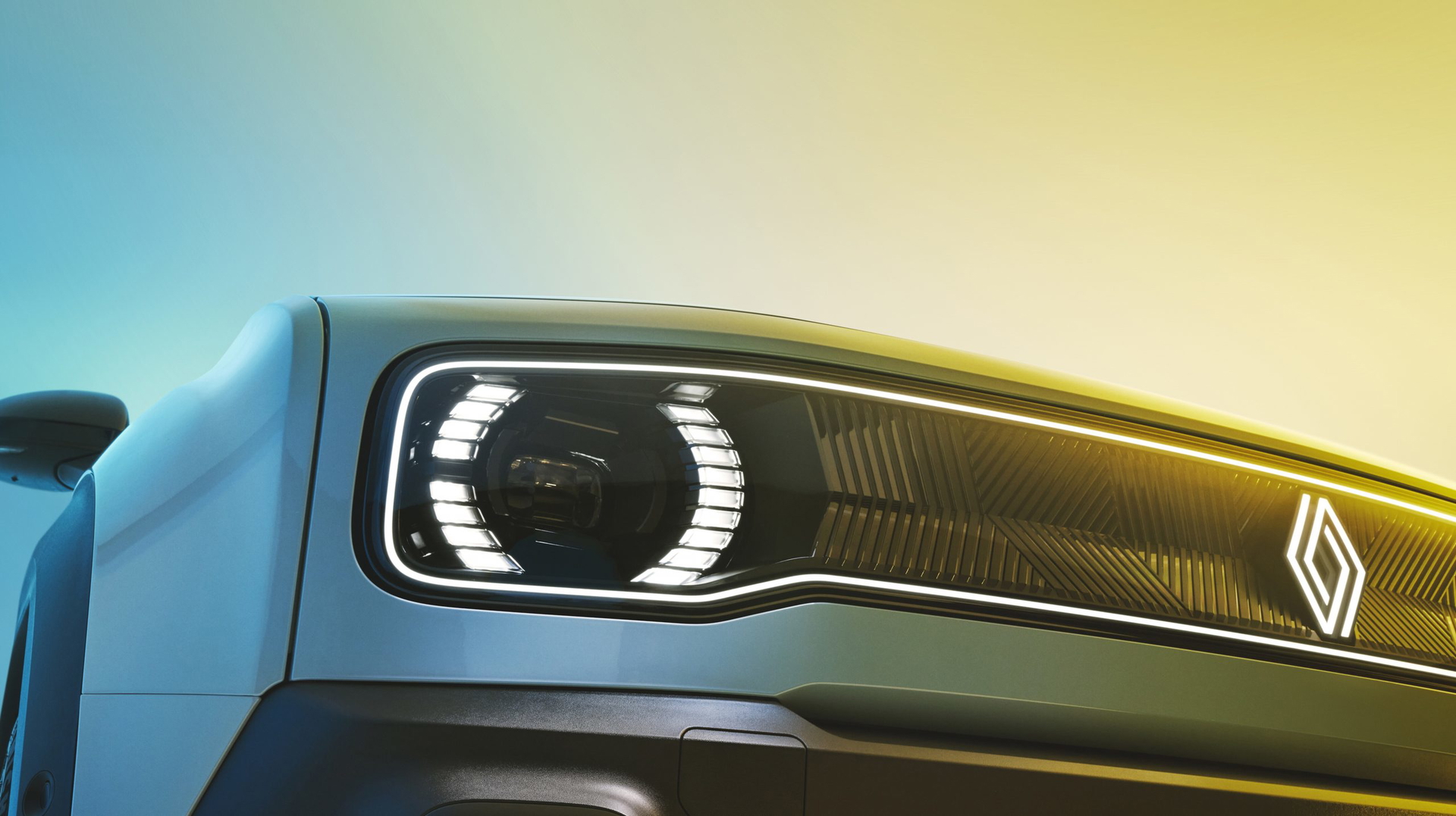 Vista cercana de la luz delantera LED del Renault 4, diseño moderno y estilizado.