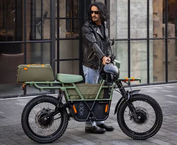 Vista lateral del UBCO 2X2, una e-bike robusta y versátil.