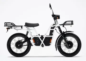 Vista lateral de la UBCO 2x2, una bicicleta eléctrica todo terreno con diseño robusto.
