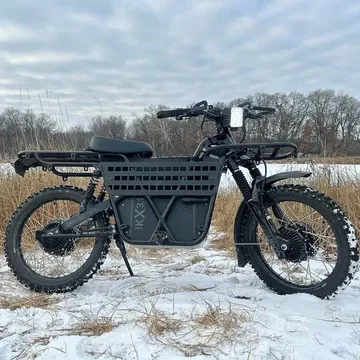 Ebike UBCO 2x2 con enfoque utilitario y robusto neumáticos todoterreno.