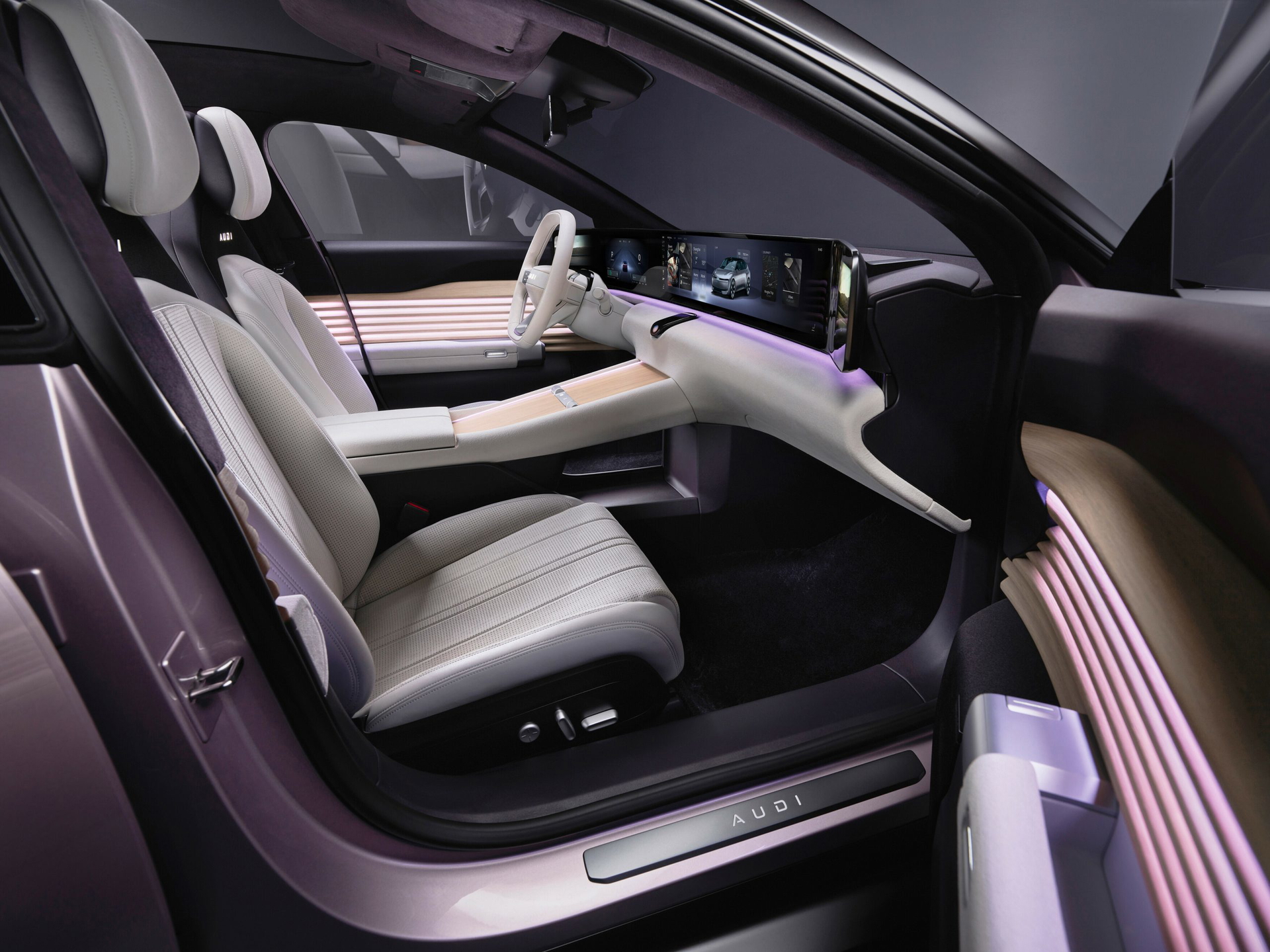 Interior futurista del primer AUDI sin los cuatro aros, con diseño premium y tecnología avanzada.