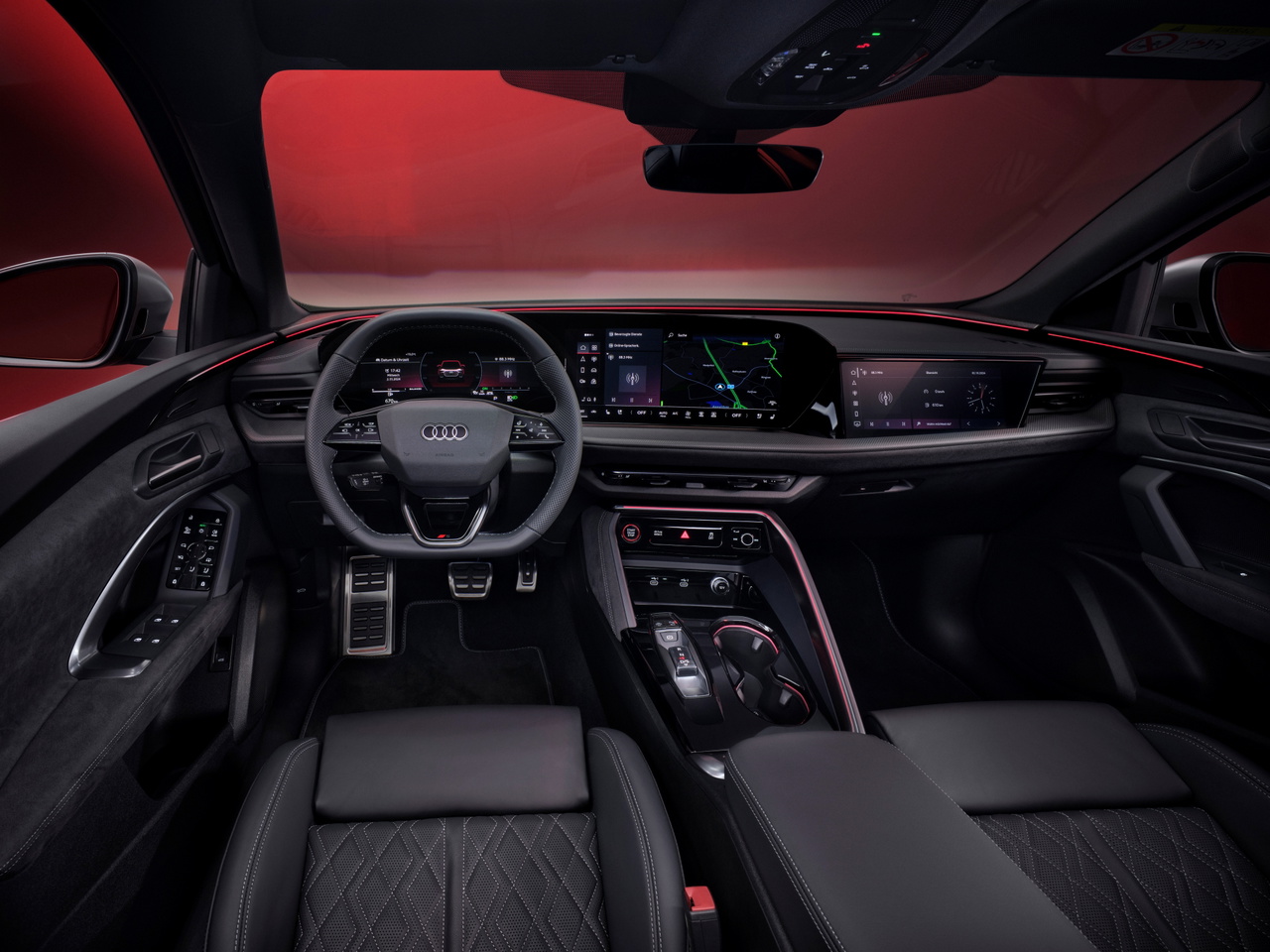 Interior moderno y minimalista del Audi Q5 Sportback, destacando su ergonomía y tecnología.