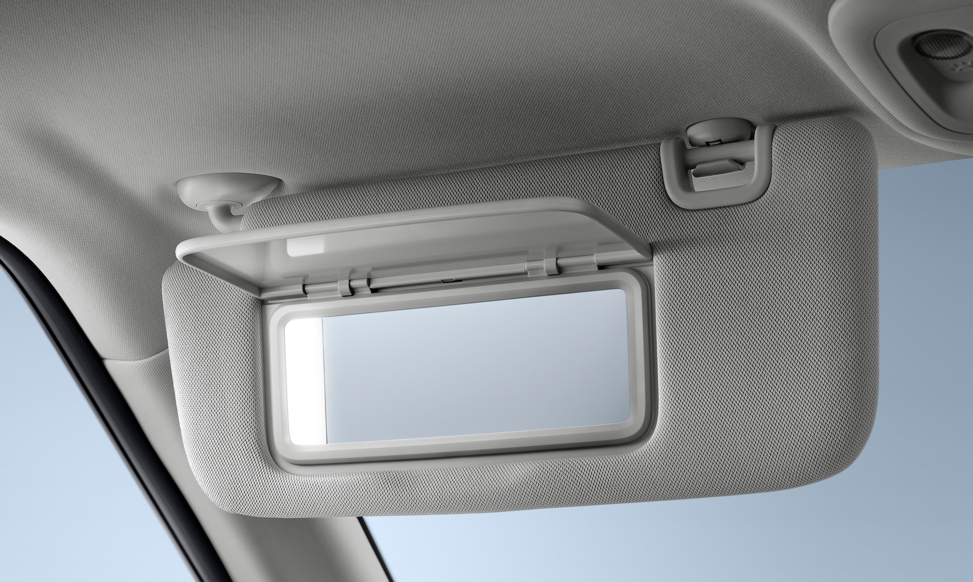 Espejo de cortesía en el interior del Dongfeng Box, diseño funcional y accesible.