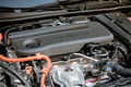 Motor eficiente mostrando componentes bidireccionales en el Honda Civic 2024.