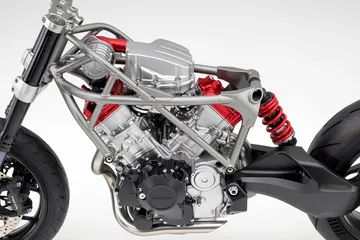 Vista detallada del innovador motor V3 de Honda con turbo eléctrico
