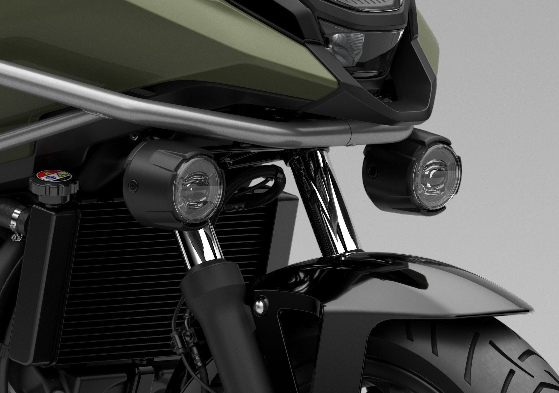 Imagen del motor y detalles del chasis de la NC750X, destacando su diseño robusto.