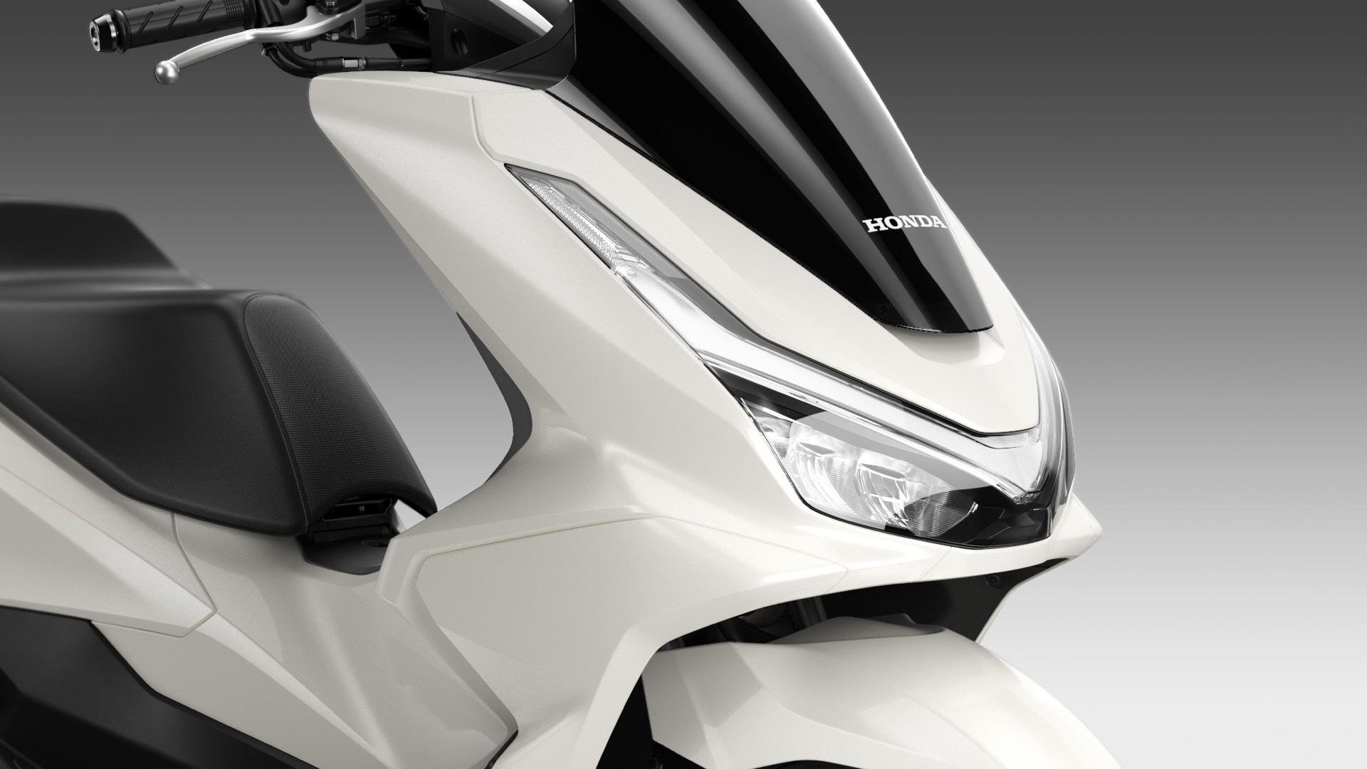 Vista lateral que muestra el diseño aerodinámico del scooter Honda PCX 125 2025
