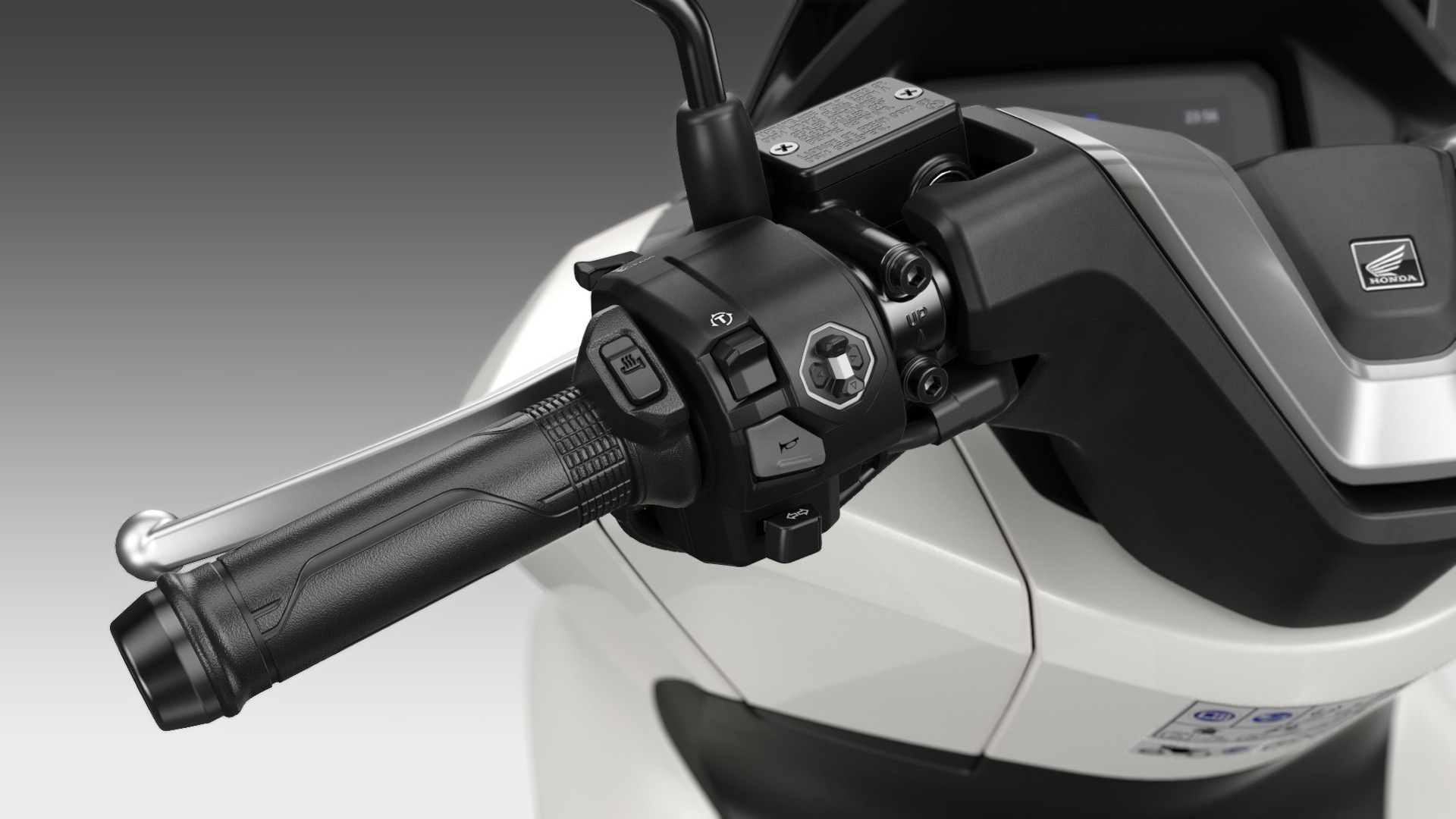 Vista detallada de la instrumentación del Honda PCX 125, ergonomía y diseño mejorados.
