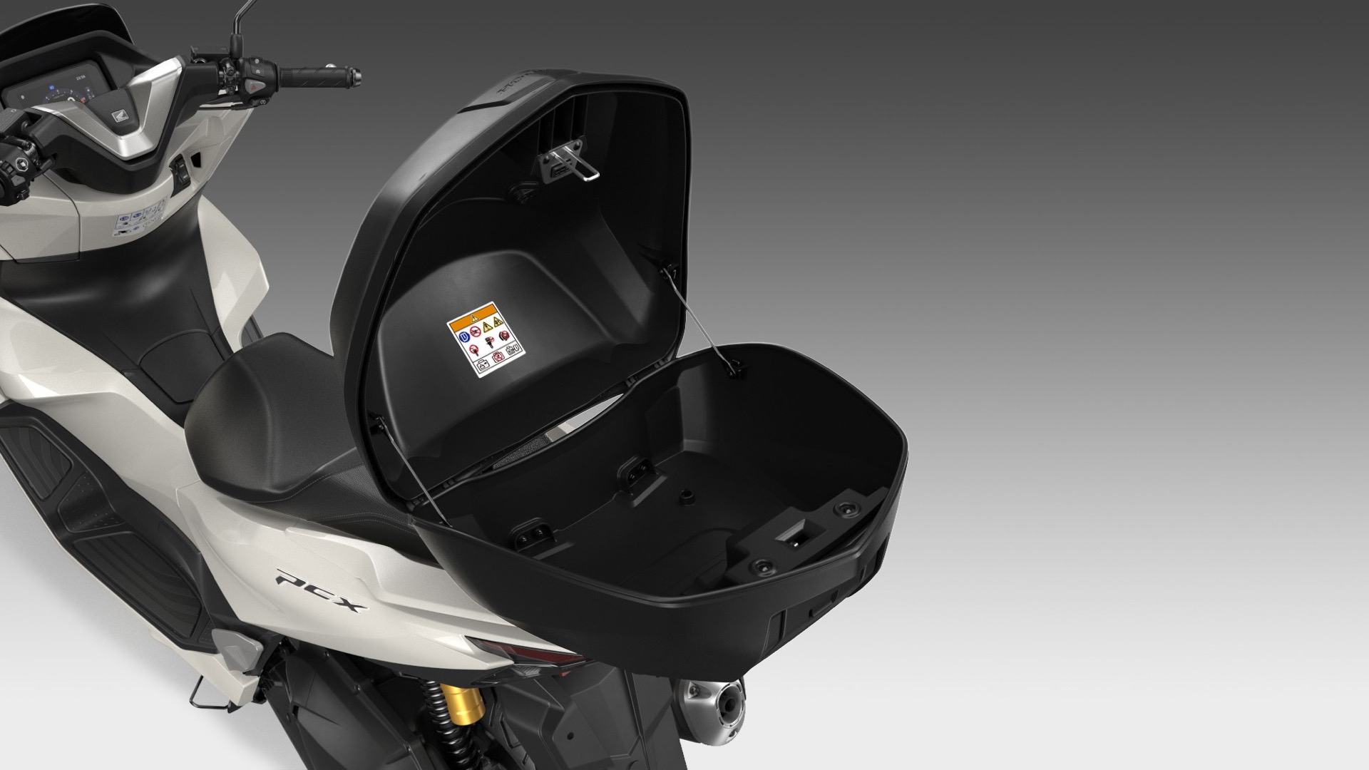 Renovado scooter Honda PCX 125, diseño elegante y funcional.