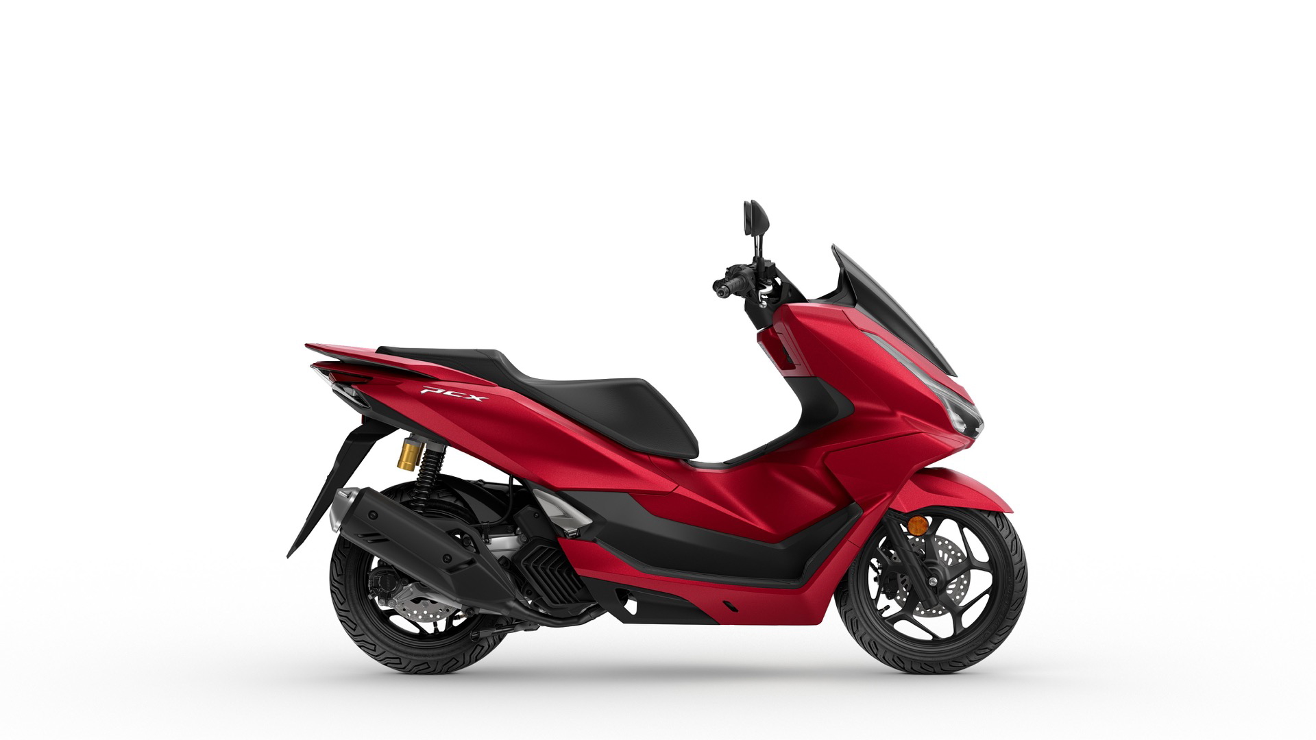 Vista lateral del Honda PCX 125 2025, luciendo un diseño moderno y funcional.