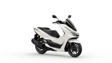 El Honda PCX 125 muestra su diseño lateral elegante y funcional, listo para dominar la ciudad.