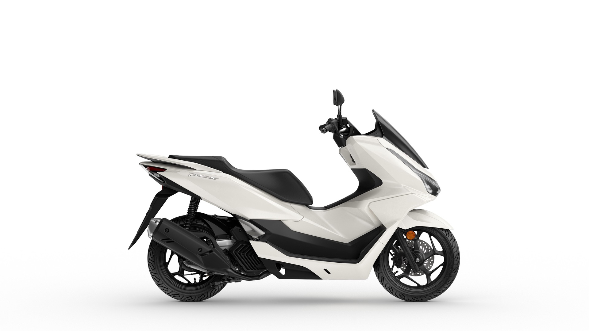 Vista lateral del Honda PCX 125, resaltando su diseño aerodinámico y modernas líneas.