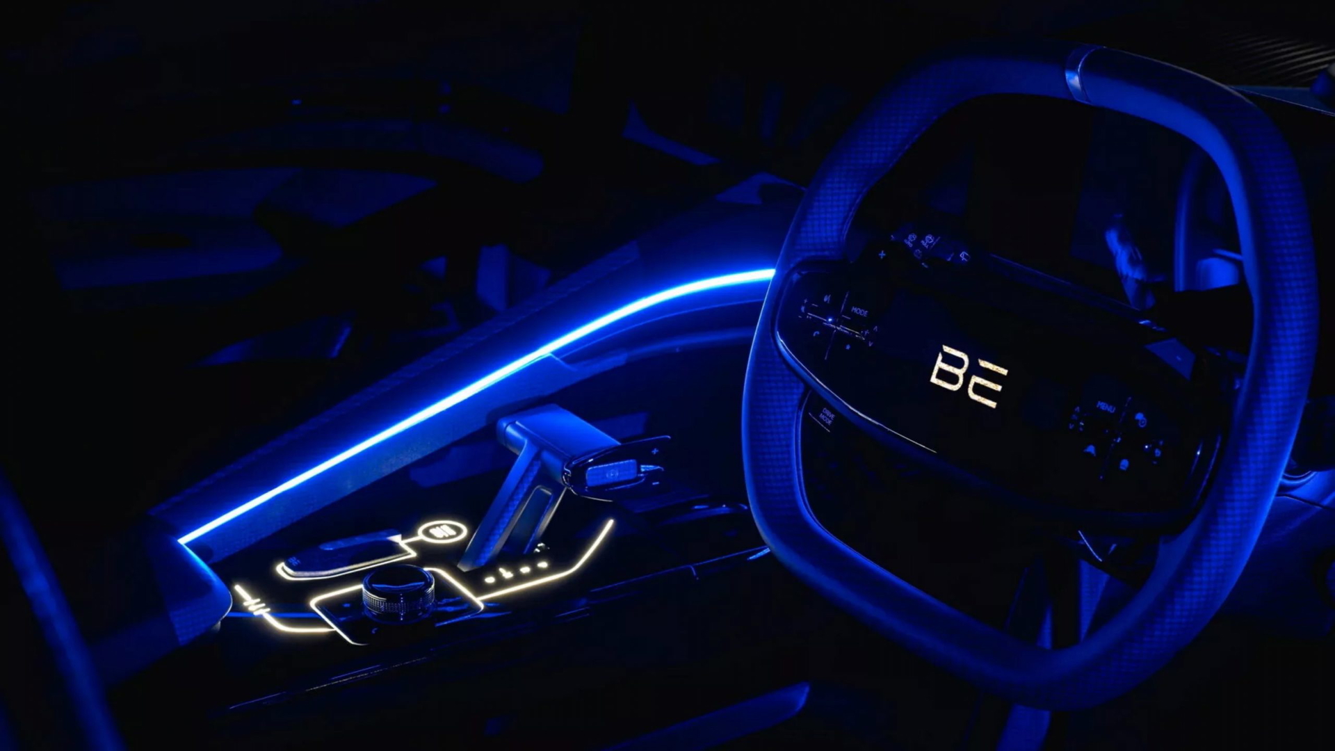 Diseño futurista con iluminación LED en el panel y el volante.