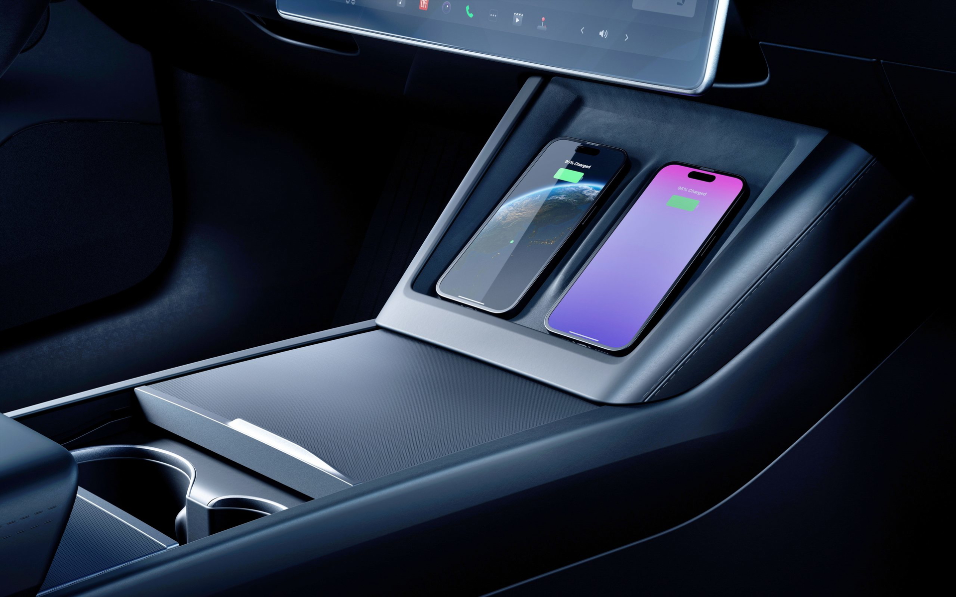 Interior del Tesla Model 3, con espacio para cargar dispositivos móviles.
