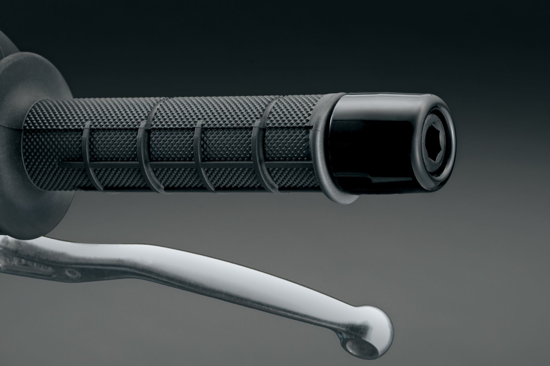 Vista detallada del puño del acelerador, mostrando calidad y ergonomía.