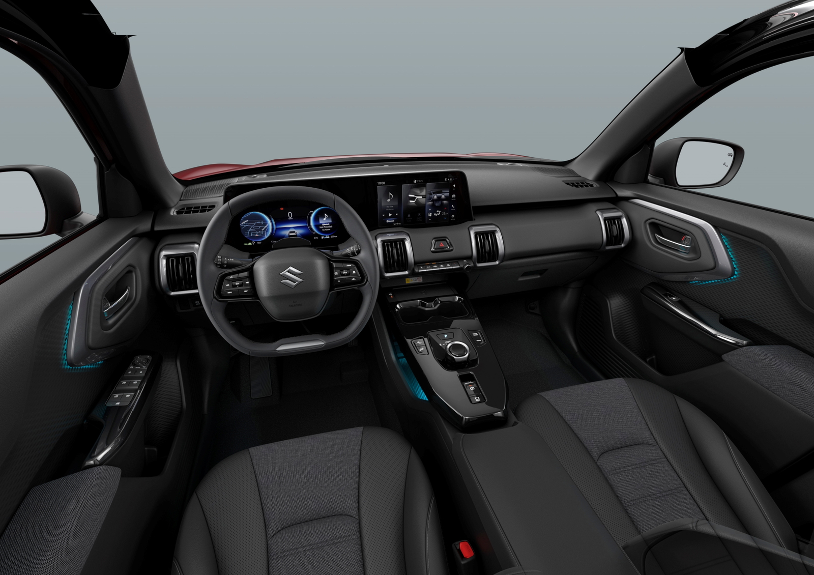 Vista del tablero y volante del Suzuki e-Vitara 2025, con diseño ergonómico. Vista del tablero y volante del Suzuki e-Vitara 2025, con diseño ergonómico.