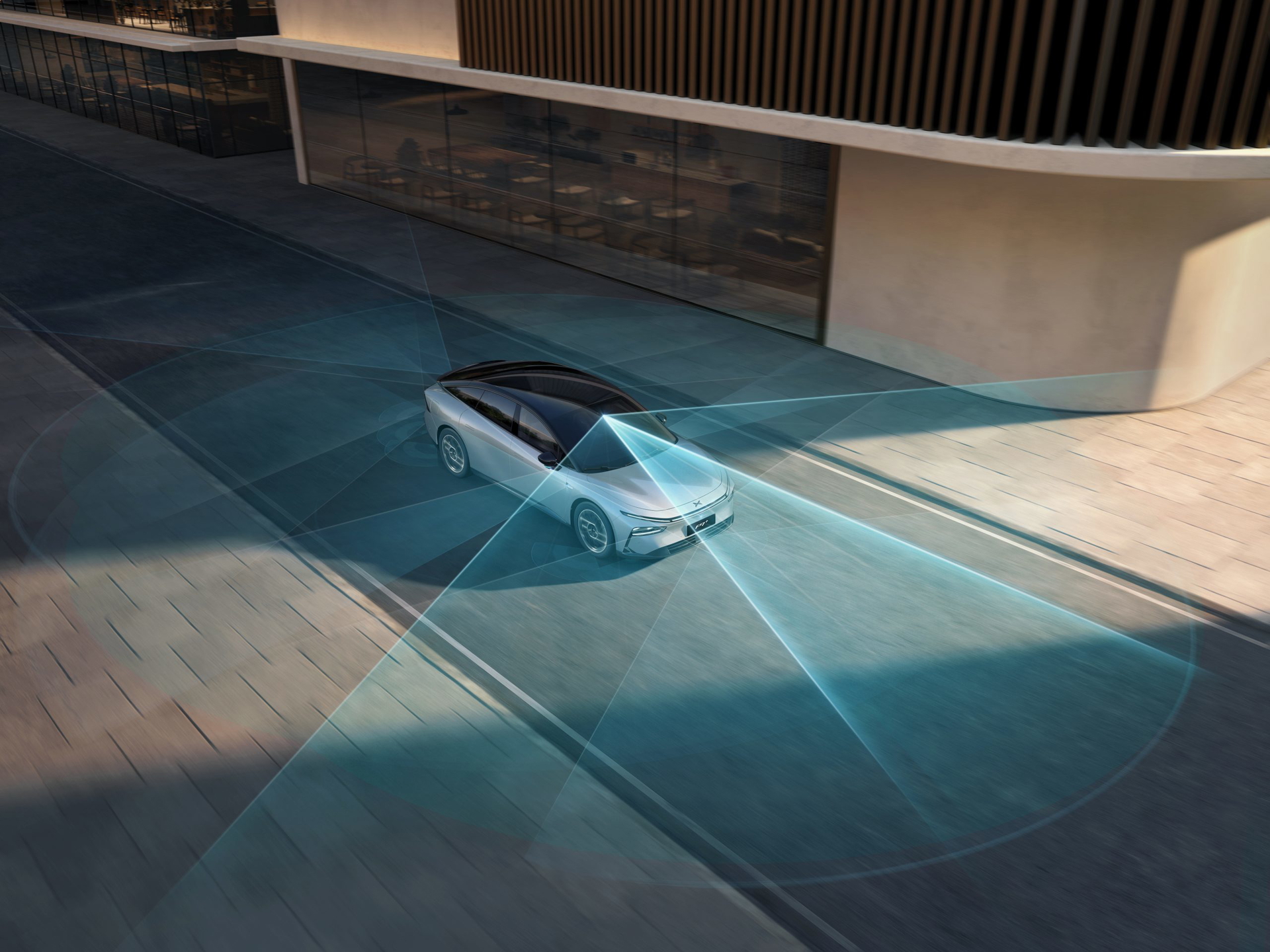 Vista aérea del XPeng P7 destacando su diseño y sistema de iluminación.