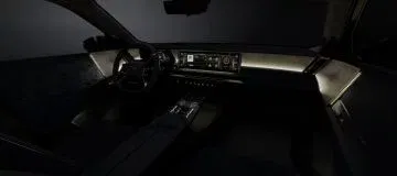 Diseño futurista con volante distintivo y acabados elegantes. Diseño futurista con volante distintivo y acabados elegantes.